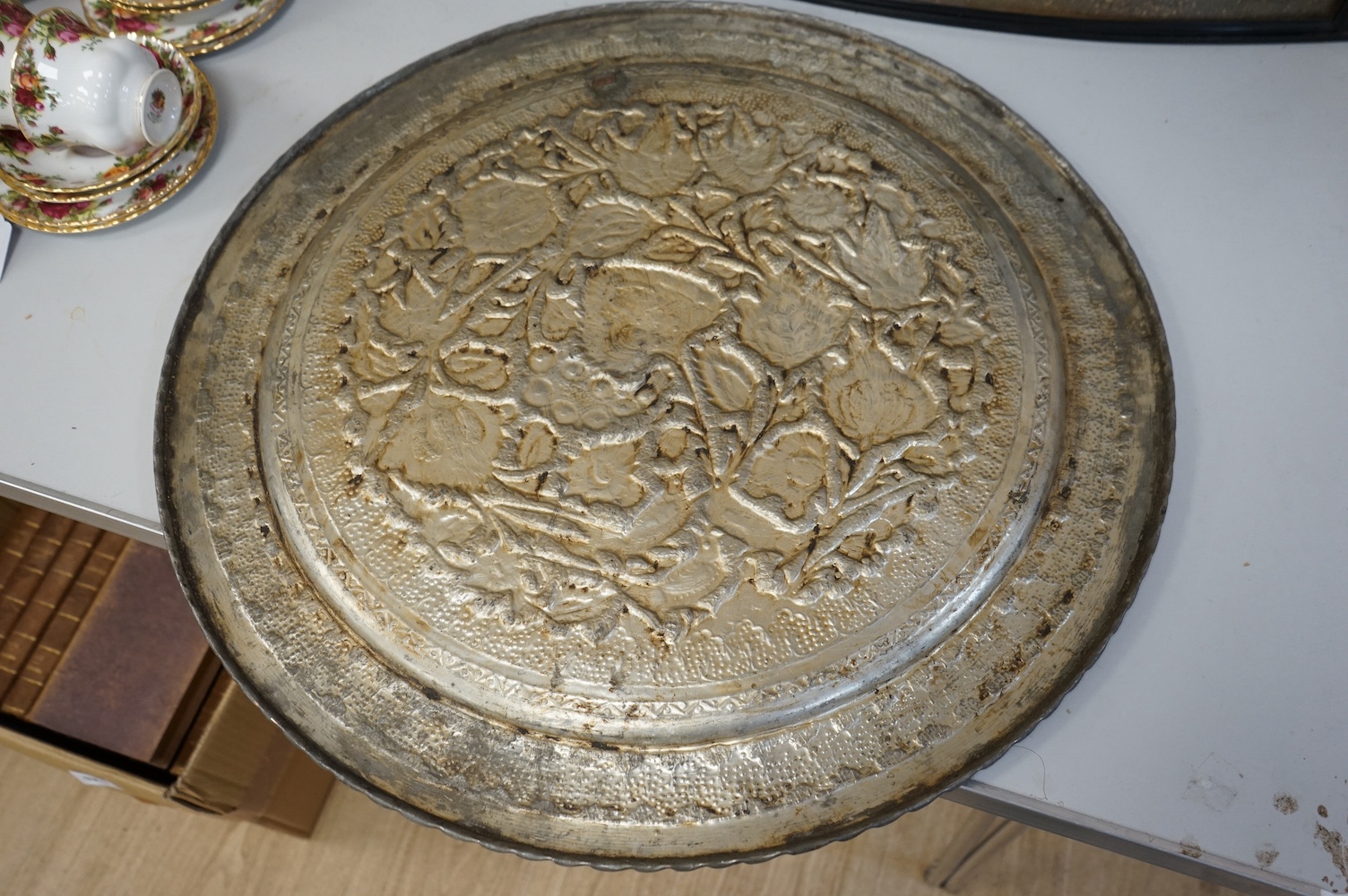 An Isfahan tinned copper tray, 59cm diameter. Condition - fair